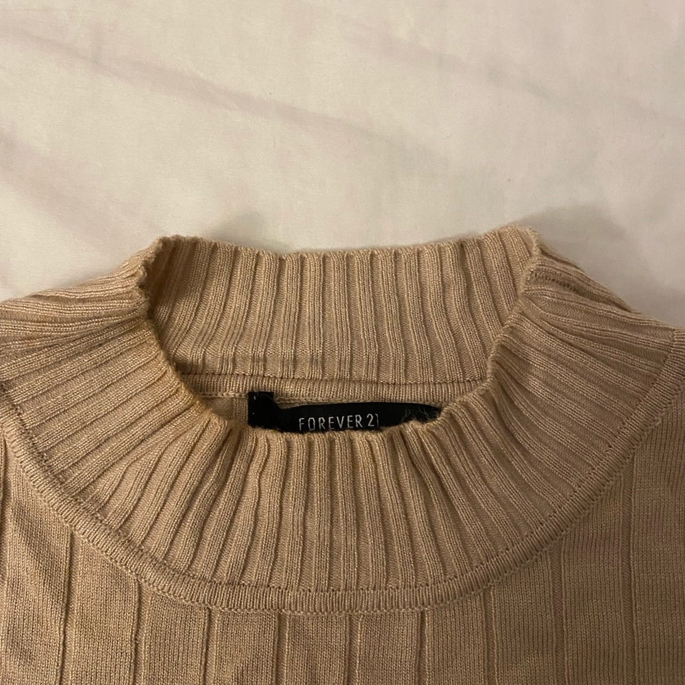Turtle neck tan shirt